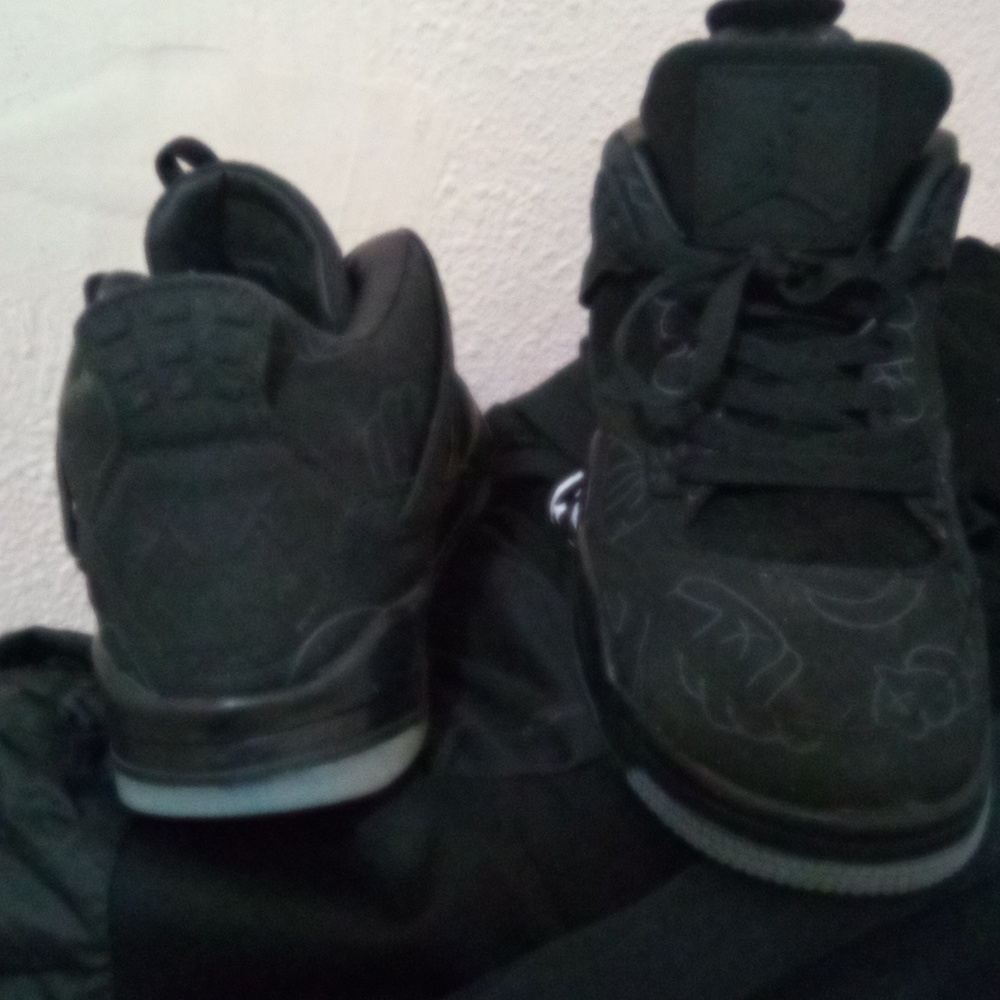 Size 10 Jordan 4's Kaws